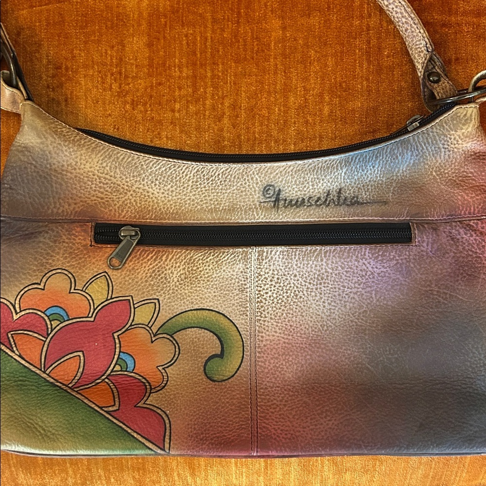 Anuschka hand-painted genuine leather bag featuring floral lotus artwork. - Picture 4 of 12